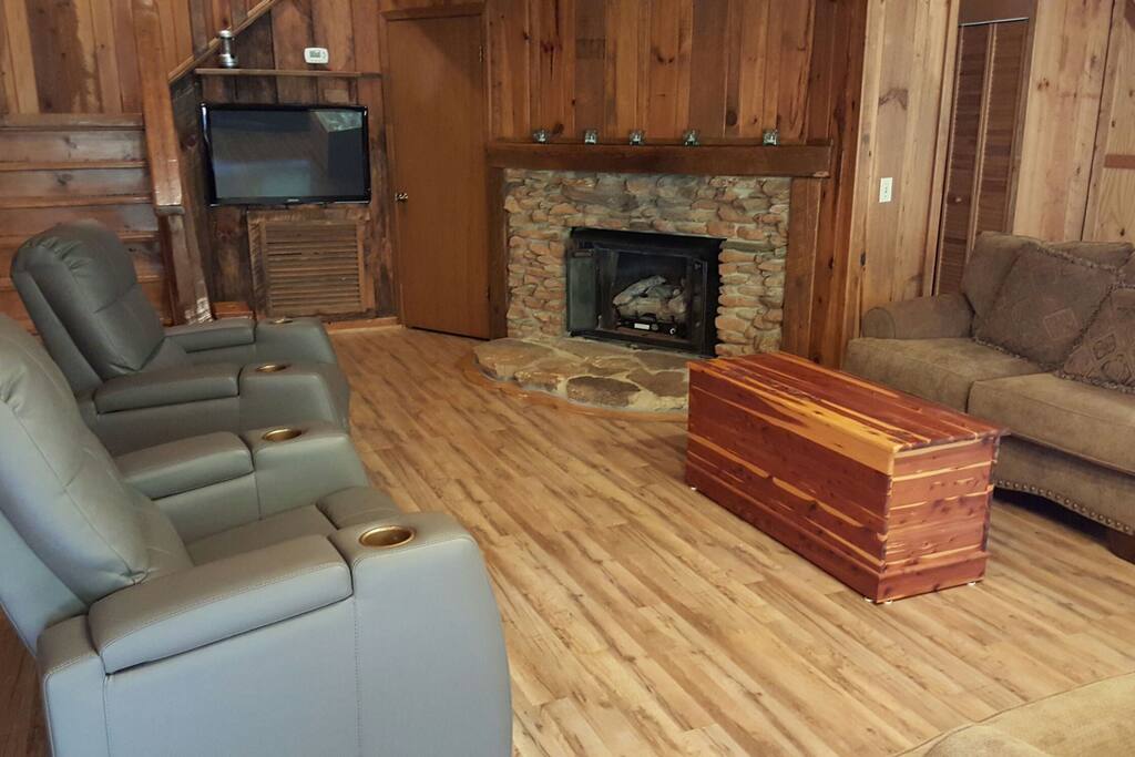 Gas log fireplace in den area