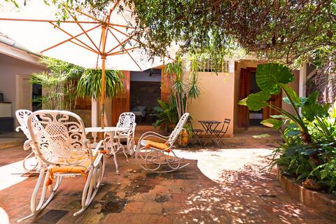 CasaBarmarin, a lush green patio in the old center