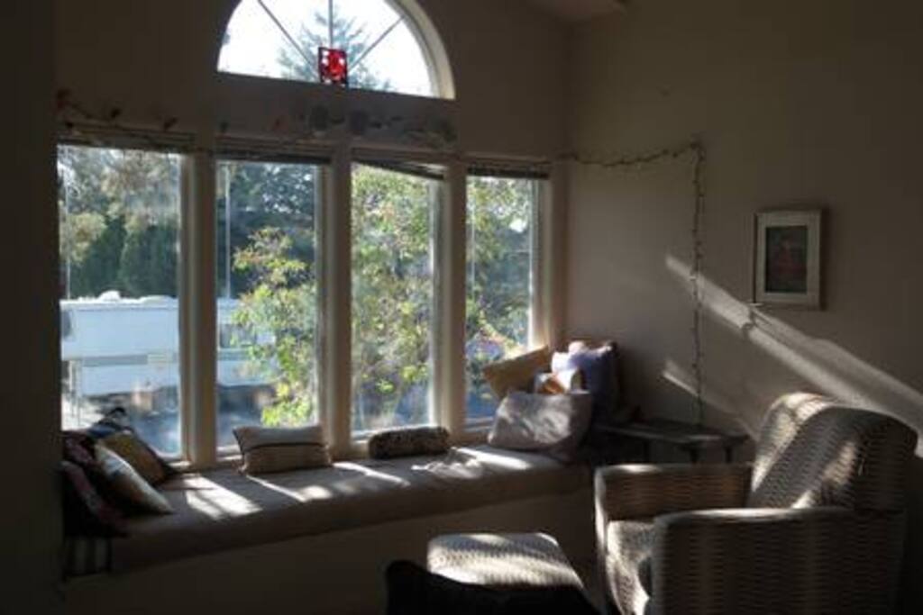 Relaxing window seat with mountain views.
