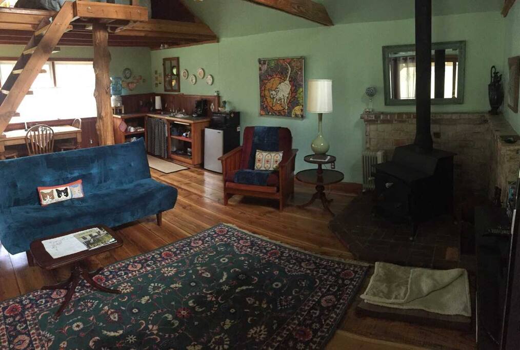 Wide angle living with kitchen in back