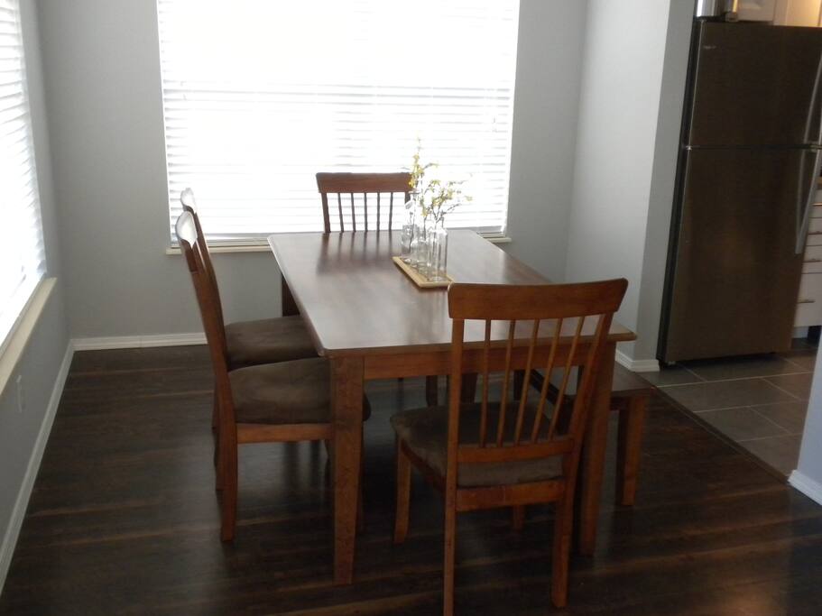 Dining table right off the kitchen perfect dining or family game night!