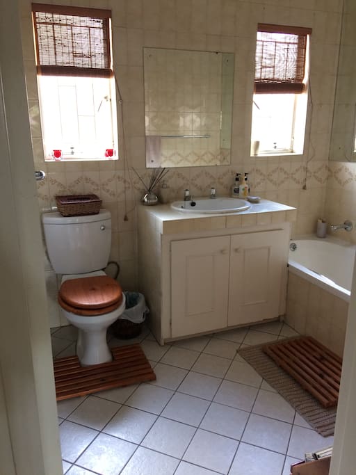 Bathroom with shower and comfortable bath