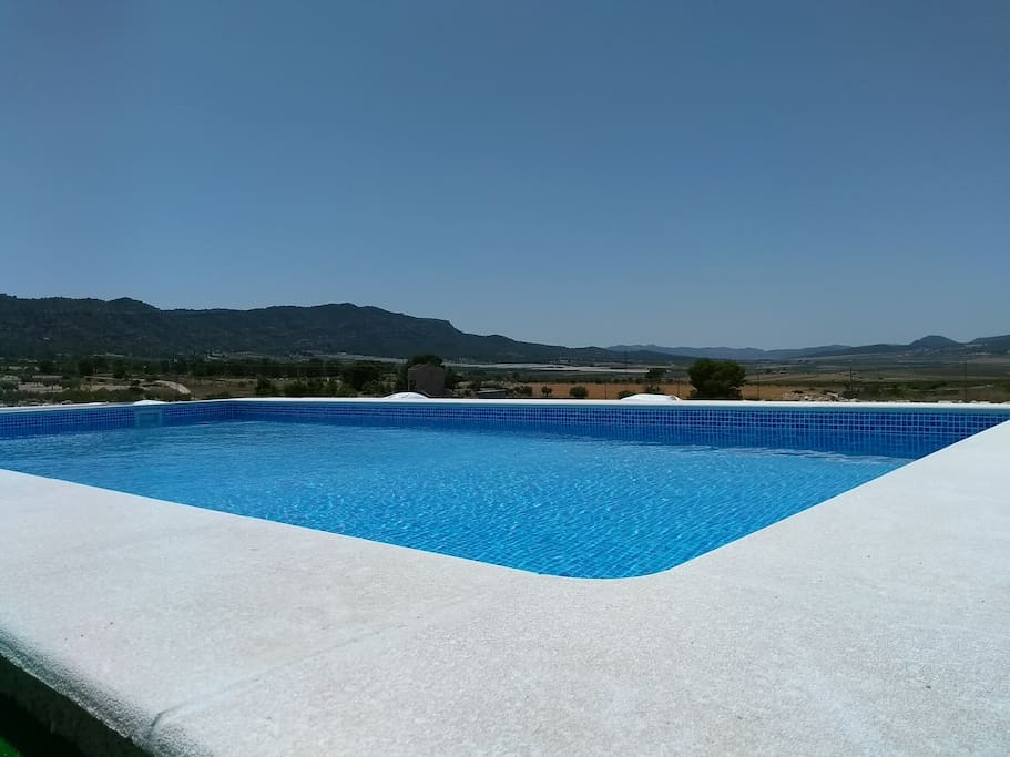 Our lovely pool with fantastic mountain views
