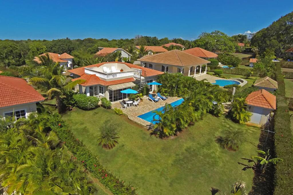 Private swimming pool nestled in tropical garden