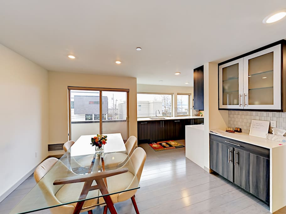 Savor home-cooked meals at the 4-person dining table.