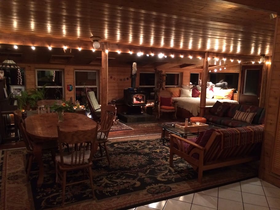 You get full access to the living room with rustic local log posts