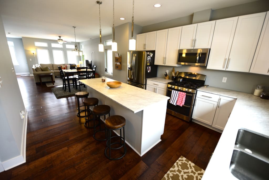 spacious/fully stocked kitchen with bar seating for 4 and huge 5'x5' pantry - brand new stainless steel appliances and carrera marble countertops