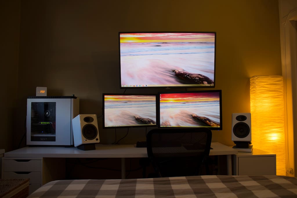 Enjoy high end speakers and large HD TV from the comfort of the bed