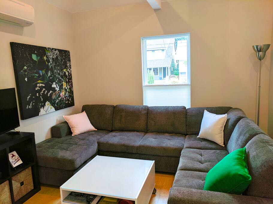 Living area with big, comfy sleeper sectional, TV and Xbox