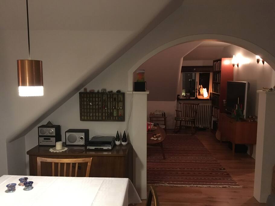View in to lounge/tv area from dining room (and the retro flat screen).