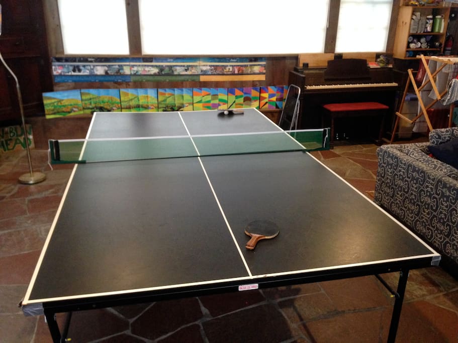 Ping Pong table and piano in the game room