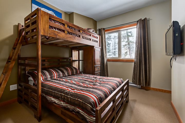Double lower bed and twin upper bed.
