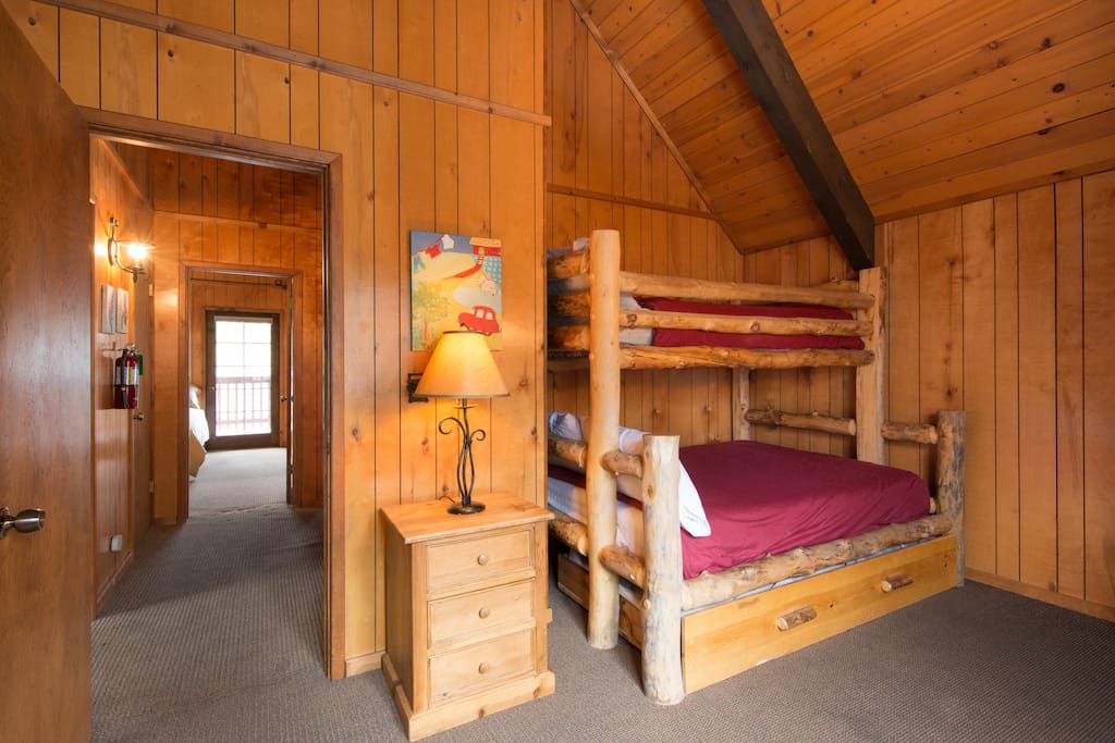 Upstairs bunk room features twin over full bed with a twin trundle. Sleeps four!