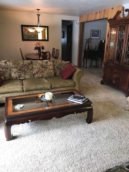 Dining room behind with seating for 8