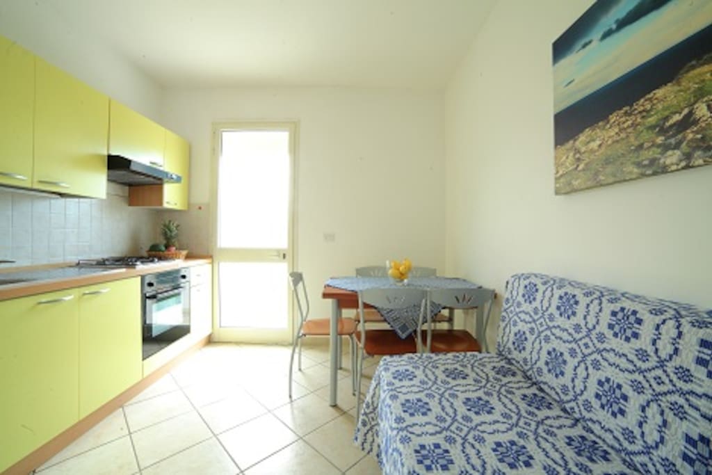Cucina con divano letto