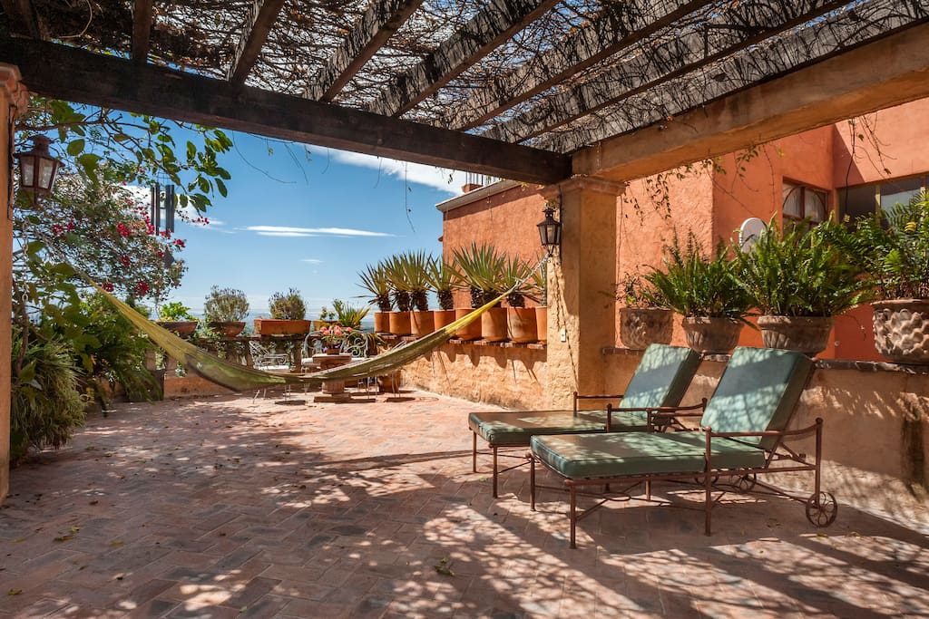 Gorgeous terrace with hammock, lounge chairs and plenty of space for your afternoon siesta or yoga practice!