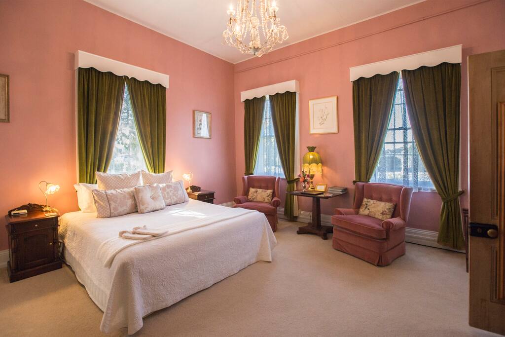 Heritage room with king bed and spa bath ensuite.