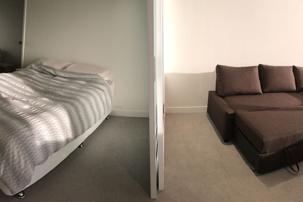 Sliding door to separate bedroom and living area.