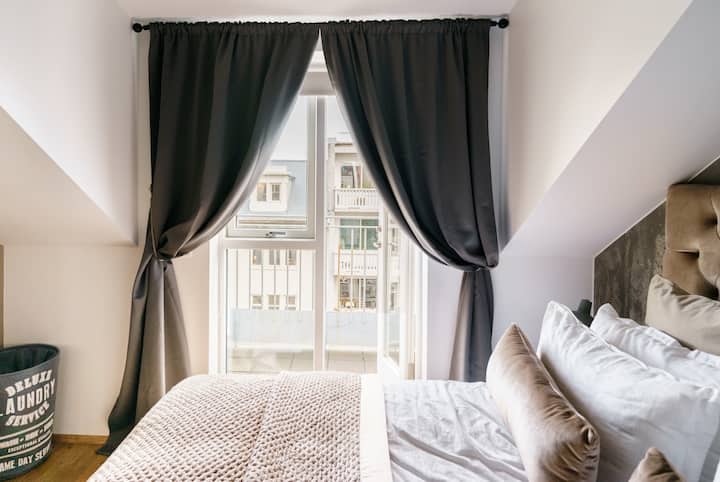 A balcony room at the north end where you can see the rays from the John Lennon Piece Tower from October to December.