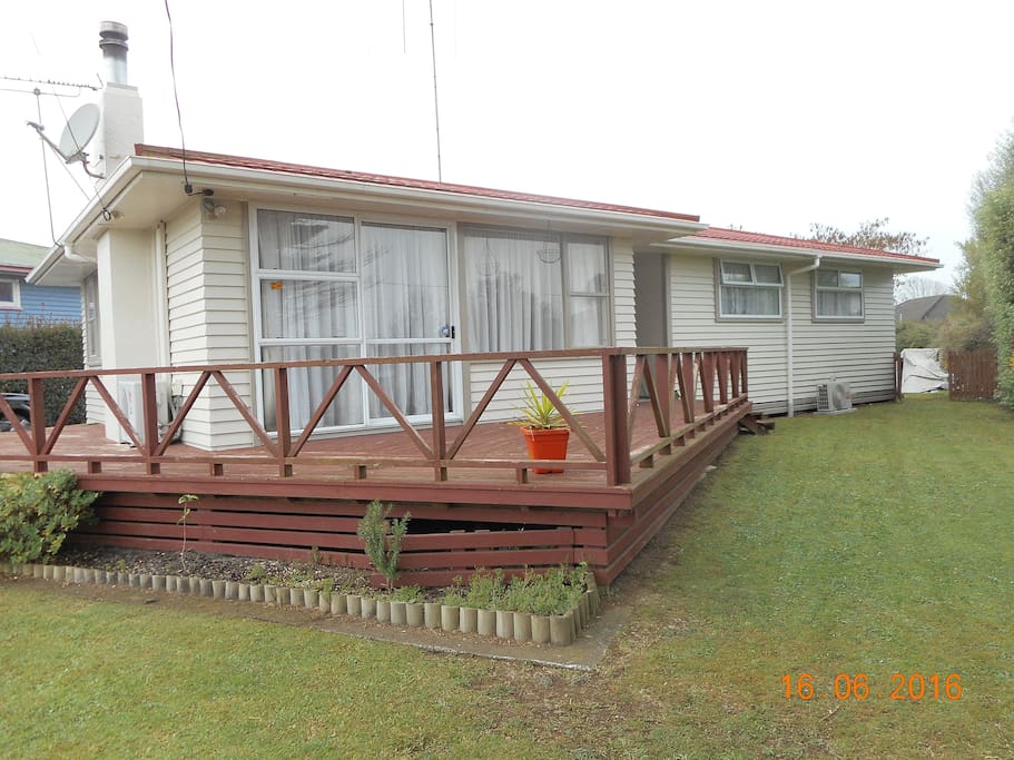 The house with a large deck to enjoy the sunshine.