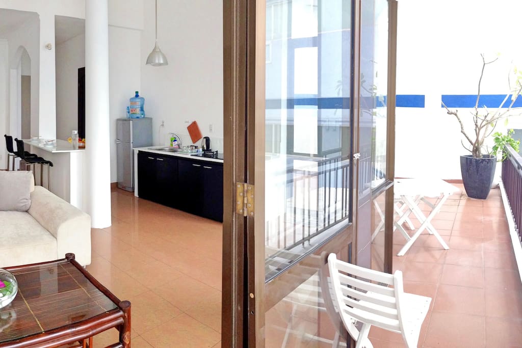 Fully equipped kitchen in open space with a big balcony