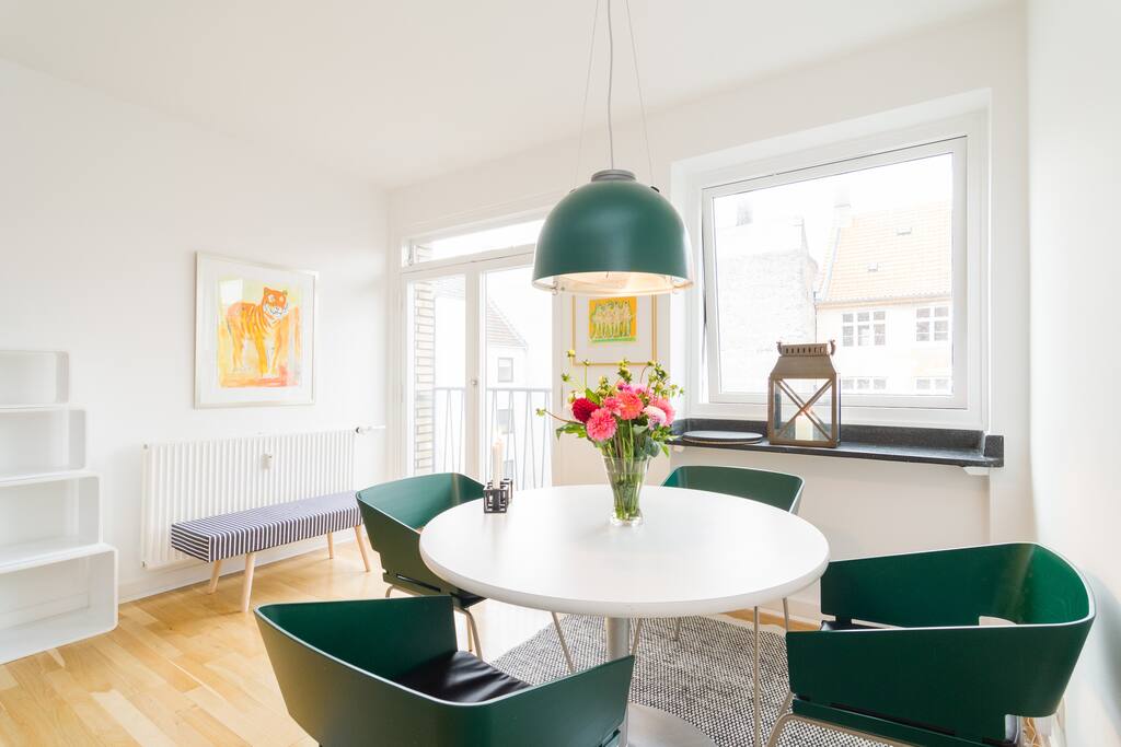 Large dining table with plenty of space for 4 chairs