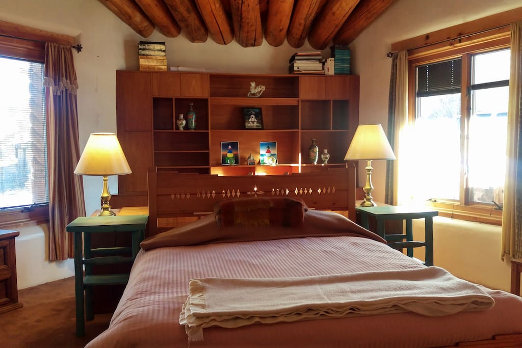 Queen size bed in the Guest Wing in spacious room.