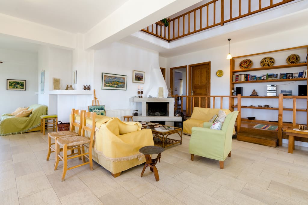 The living room and the open corridor on the right