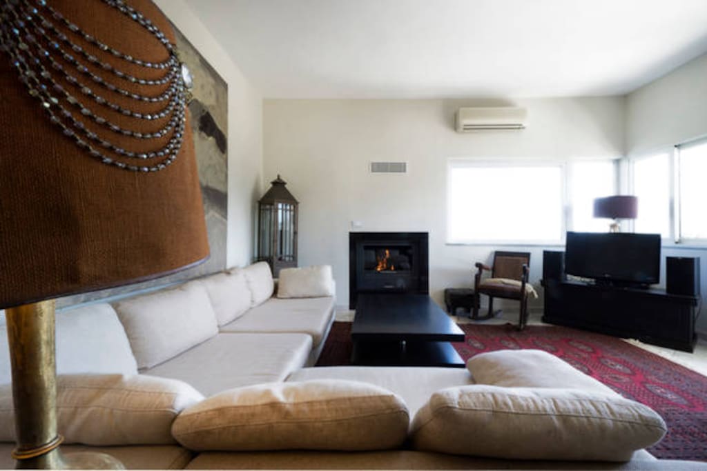 living room, fire place, tv-stereo and big corner sofa