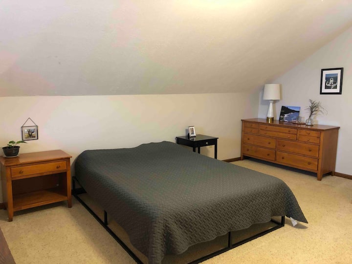2nd floor loft-type bedroom has queen bed and a futon that converts to a full bed.