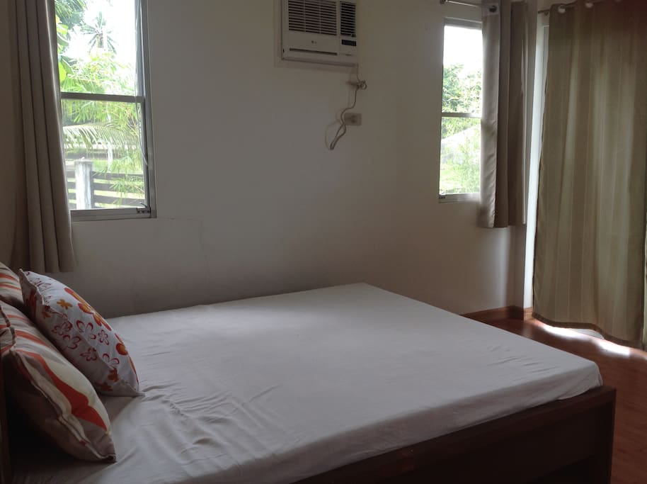 The 2nd bedroom with a queen sz bed on the main floor of the house