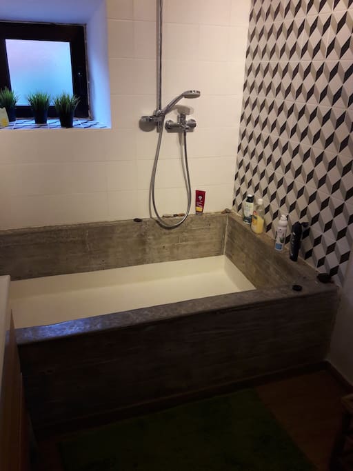 Bathroom with hand made concrete bath( 1m x 2m)