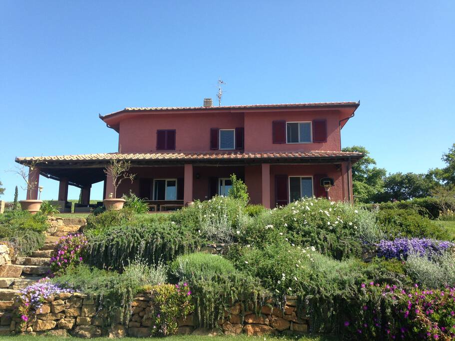 Wonderful maintained garden , house with shaded patio