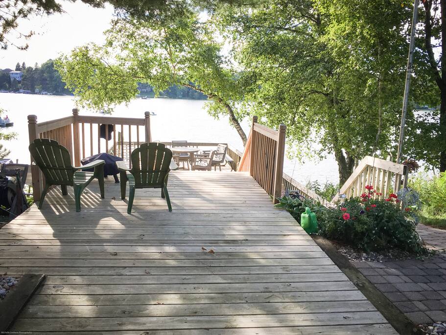 Your view of the quiet bay our boathouse sits on, with two docks just out of sight and a hot tub behind this photo.