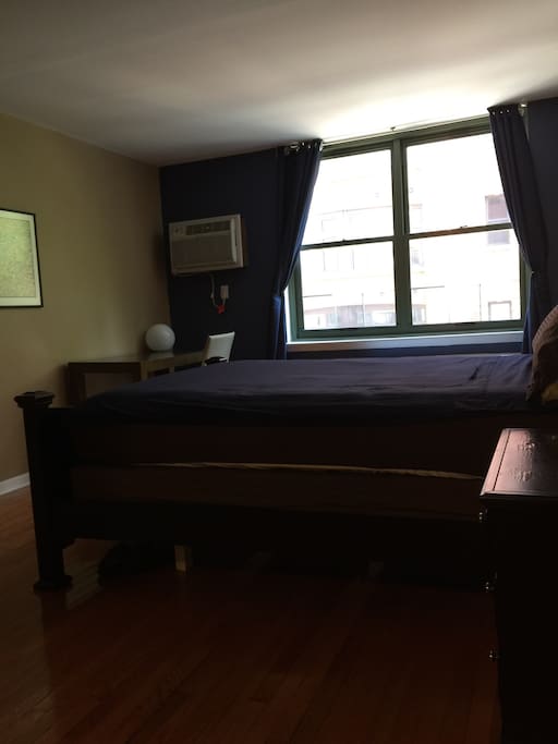 Spacious Master bedroom. Queen size mattress and as well as a workspace.