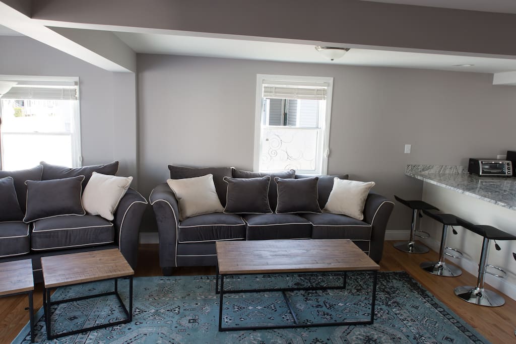 Living Room with 60" HD TV and Blue Ray Player