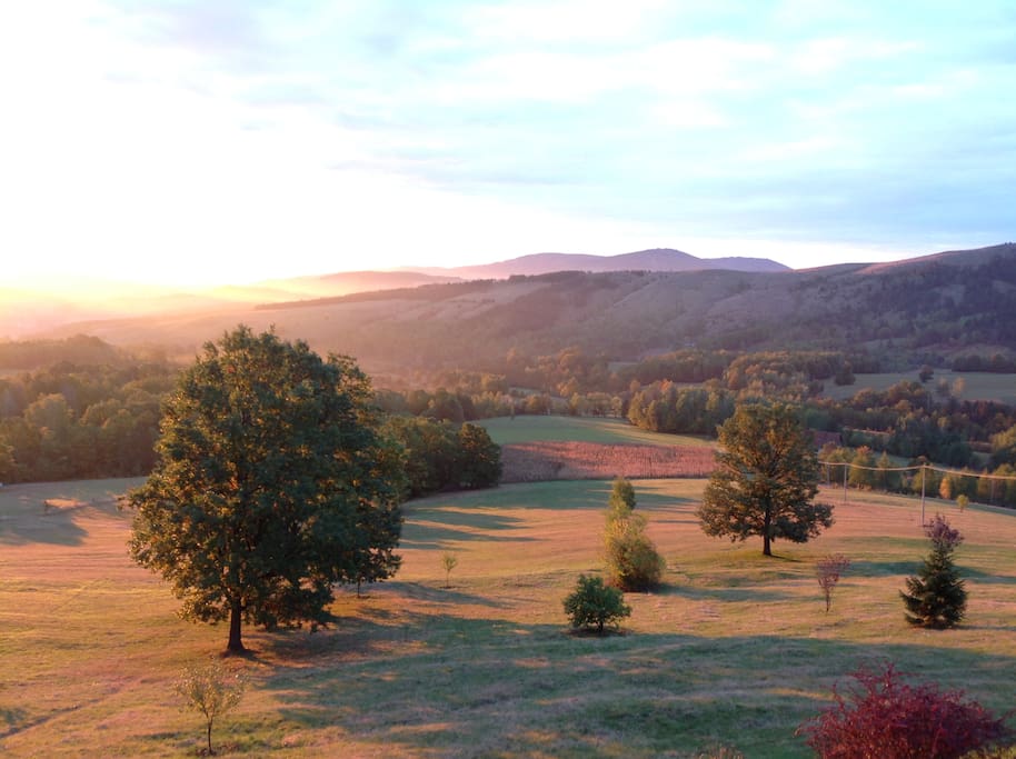 This view awaits you from one of the three balconies and all the bedroom windows. This is an autumn dawn :)