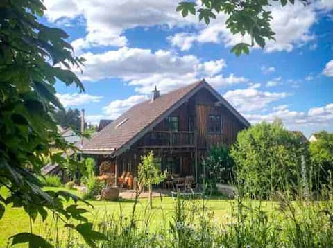 Beautiful feel-good wooden house with large garden