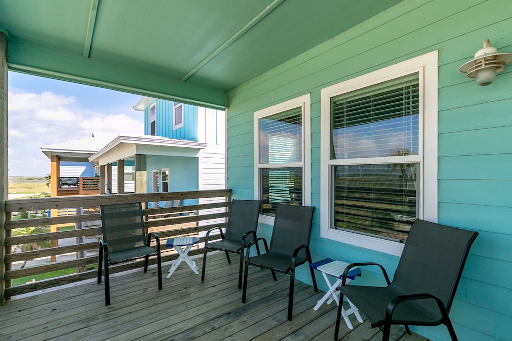 Enjoy the outdoor seating on the breezy balcony.