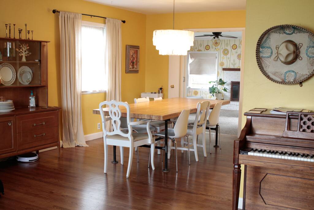 Large table made from a bowling lane seats 8-10 people