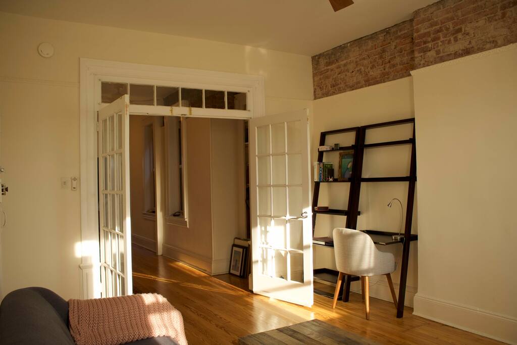 We love the original details in our pre-war brownstone. These double doors lead to the music room.
