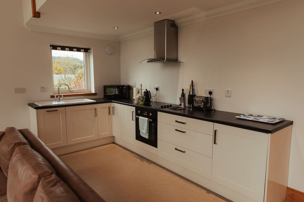 Bright, fully equipped modern kitchen.