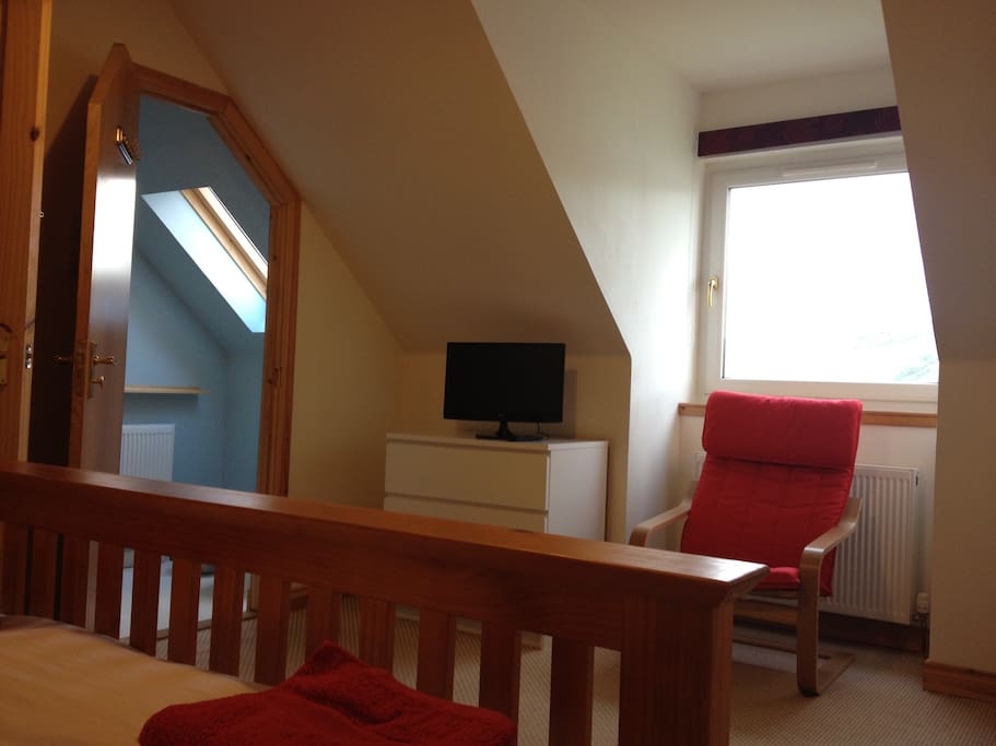 Double bedroom with ensuite shower and excellent sea views.
