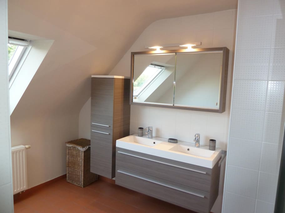 Bathroom with bath and shower