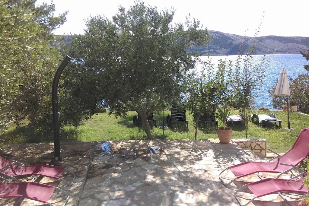 outdoor shower, lounges and parasols