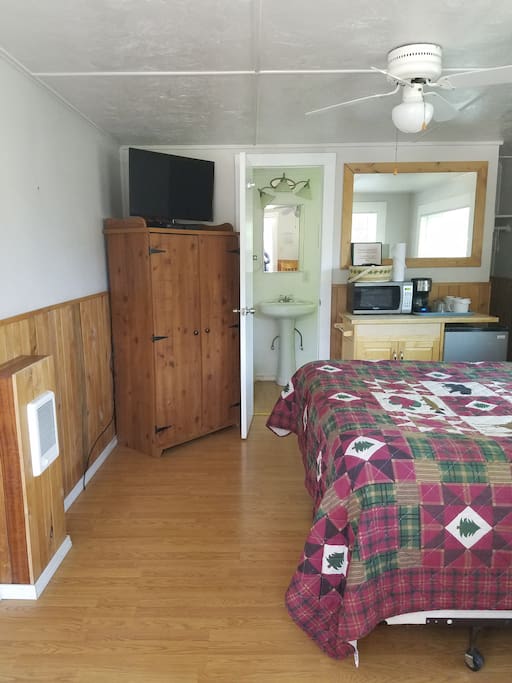 Entry view. Cabin includes microwave, small fridge, coffee maker and flat screen TV.