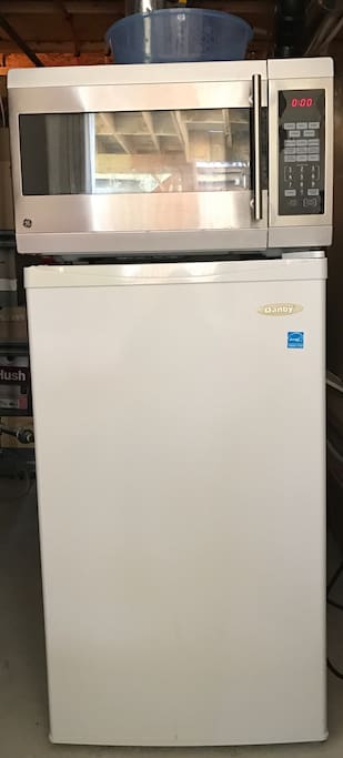 Microwave and fridge are behind the pocket door.