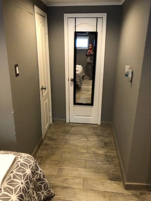 Full length mirror in bedroom
