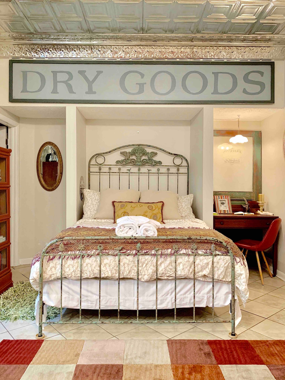 The cast iron bed was found at a historic Bed & Breakfast.  It now resides in our little studio.  Cozy, quality linens await...