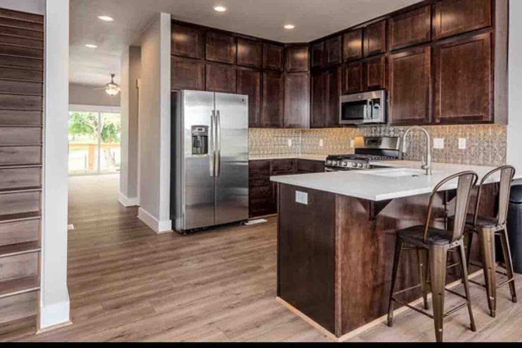Kitchen with brand new appliances.